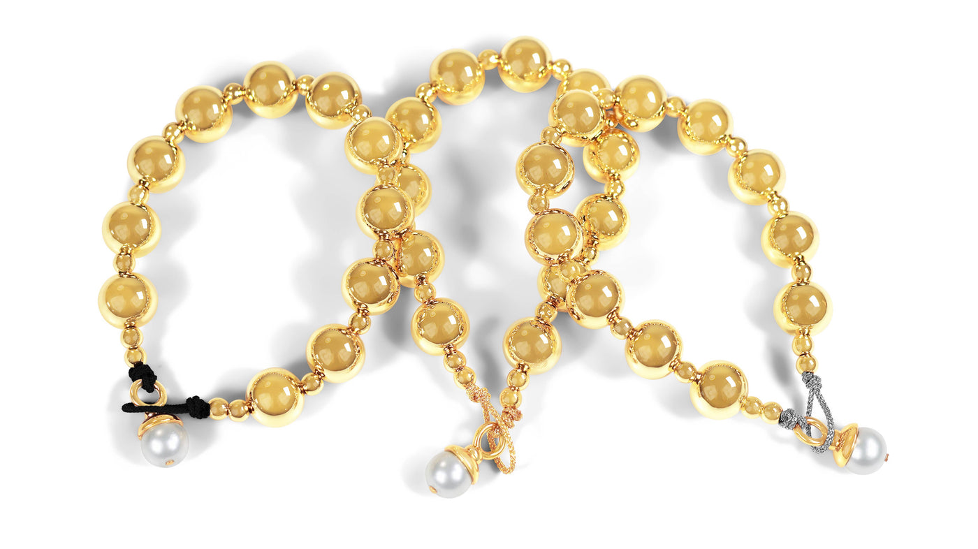 Globe Bracelet with Pearl Detail