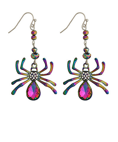A pair of dangling spider earrings with iridescent rainbow-colored legs, silver hooks, and large pink teardrop gemstones on a plain white background.