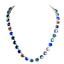A handmade silver-tone necklace featuring a gradient of faceted round rhinestones transitioning from deep blue to light blue, teal, and amber-brown, displayed on a solid white background.